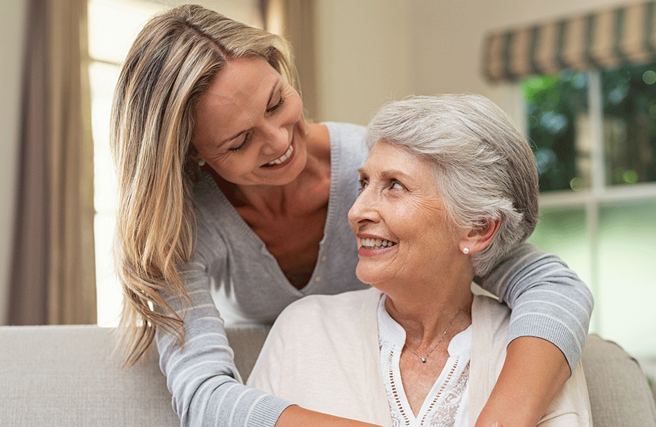 adult child caring for elderly parent